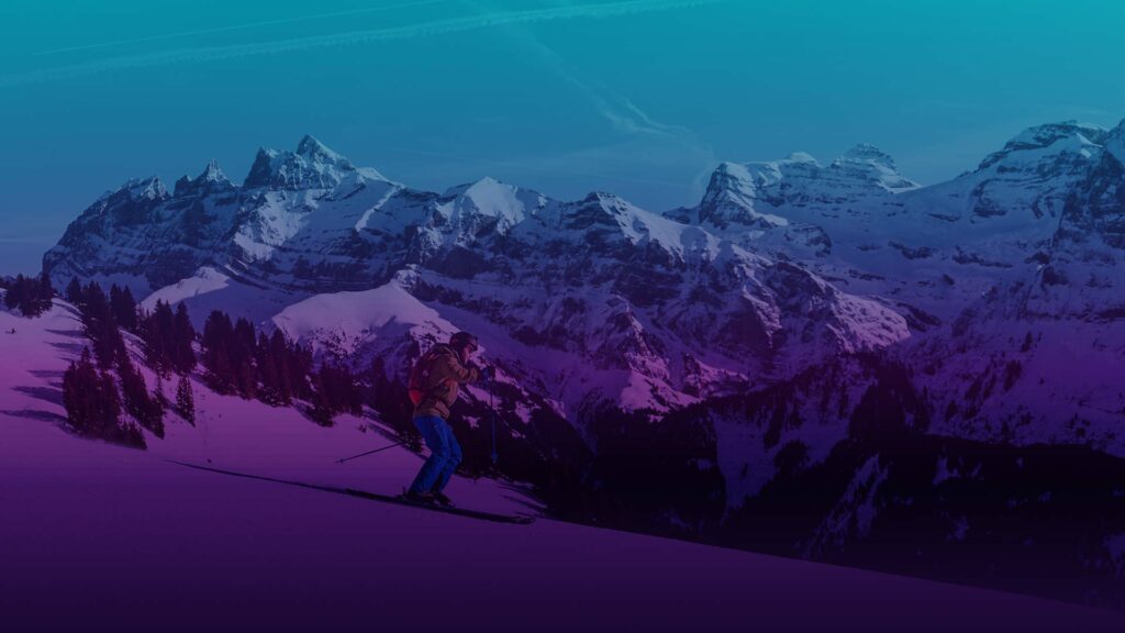 In einer Berglandschaft mit vereinzelten Tannen die Skier auspacken - da schlägt das Herz eines Wintersportlers höher.